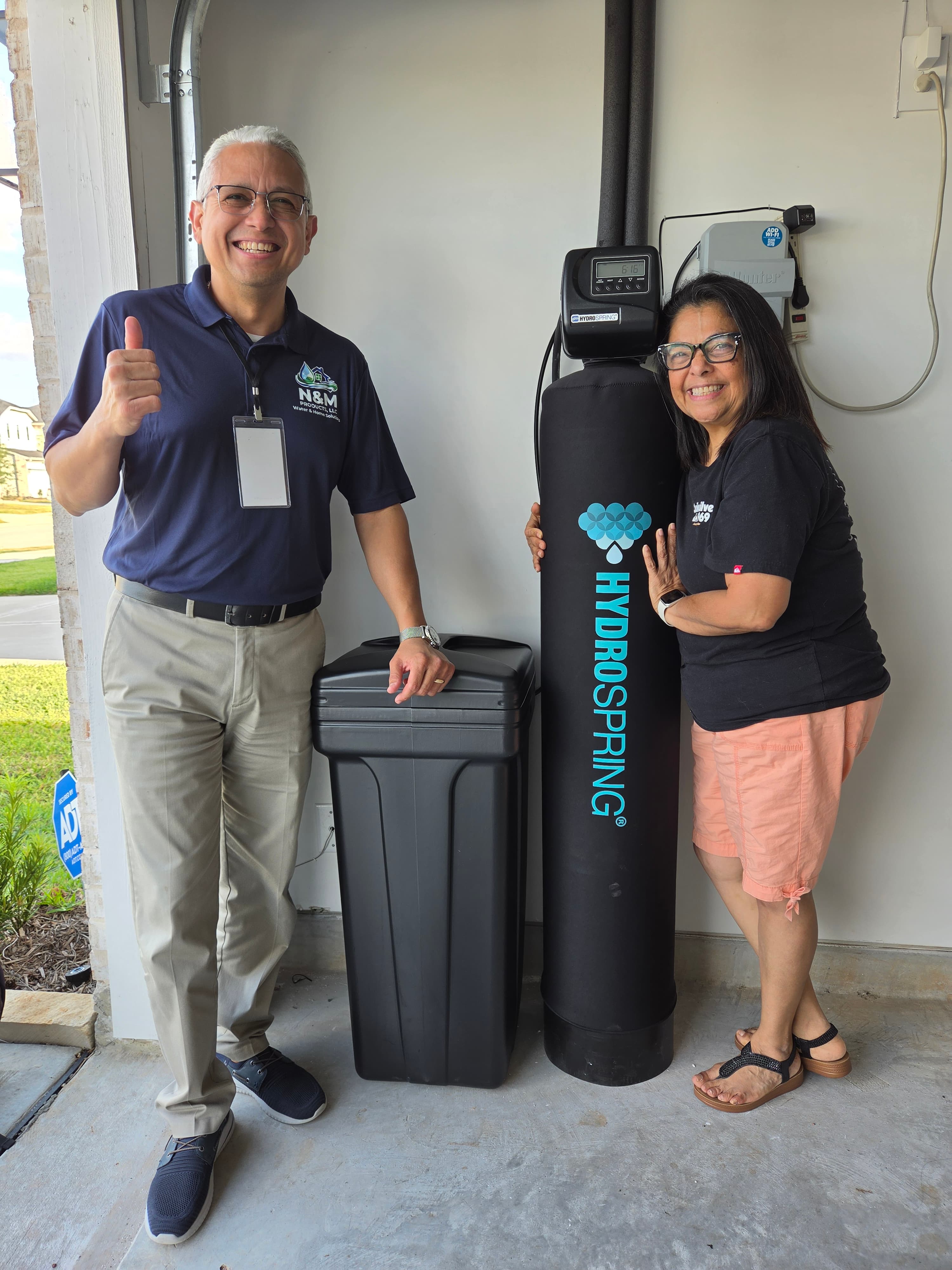 Satisfied customers with their new water system